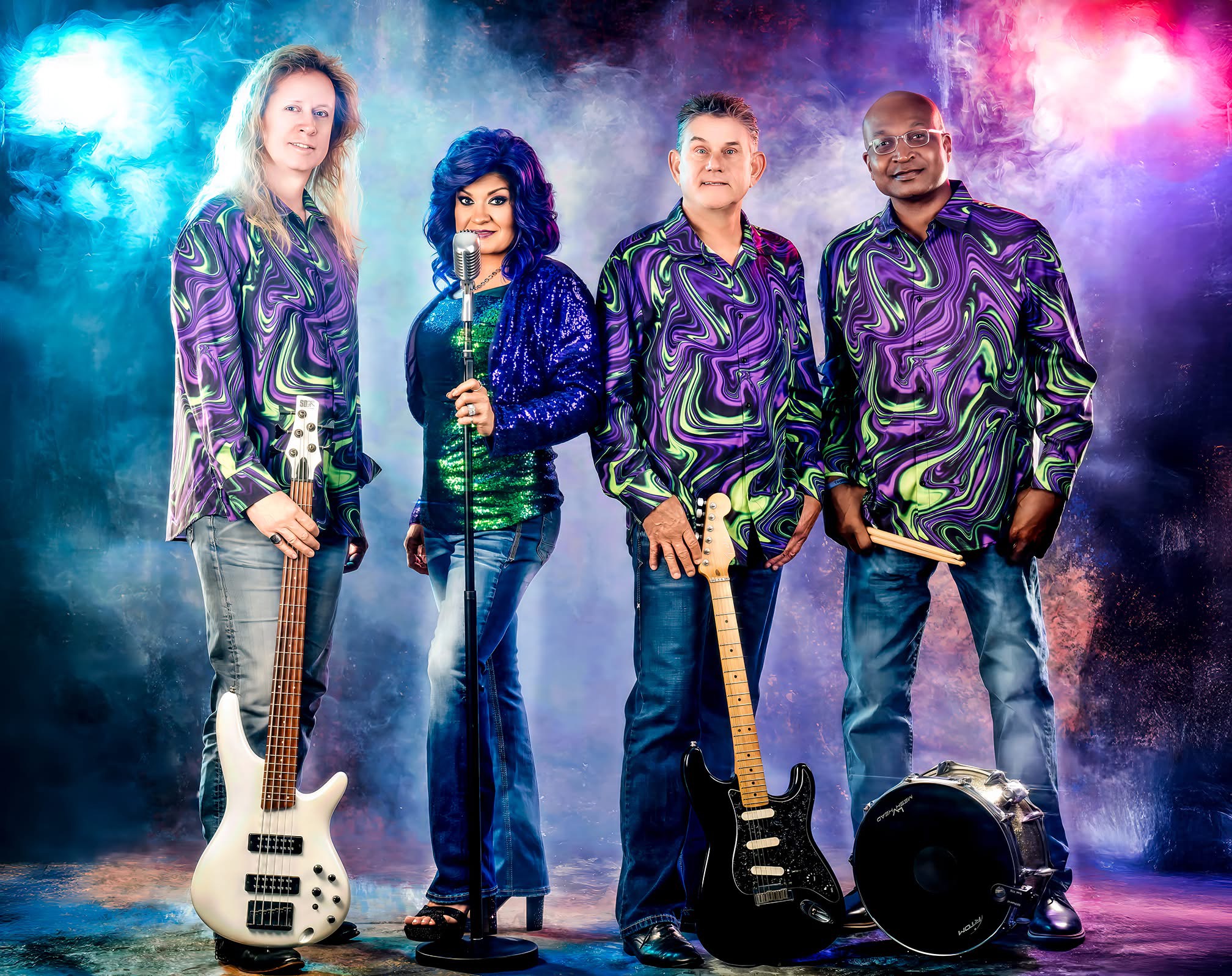 SWITCH featuring Ana band portrait with colorful stage lighting